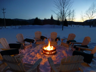 Outdoor Fire Pit with Adirondack Chairs and Wool Blankets